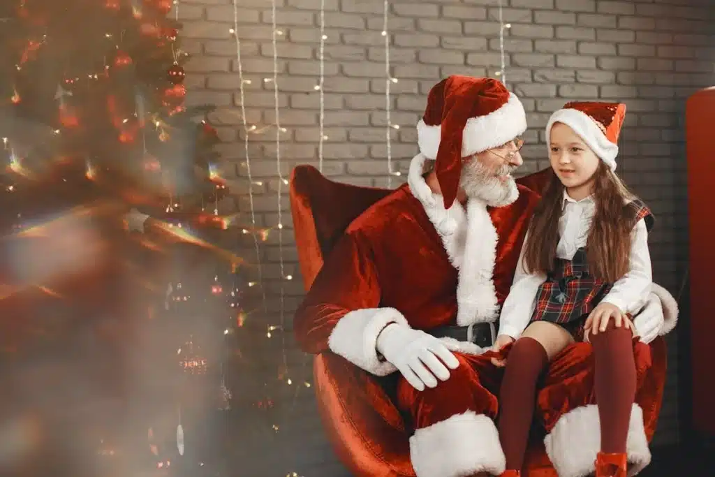 Children meeting Santa Claus at a Winterfest event in Sevierville, taking photos and sharing their holiday wish lists.