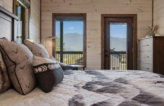 rooftop retreat gatlinburg master bedroom balcony view