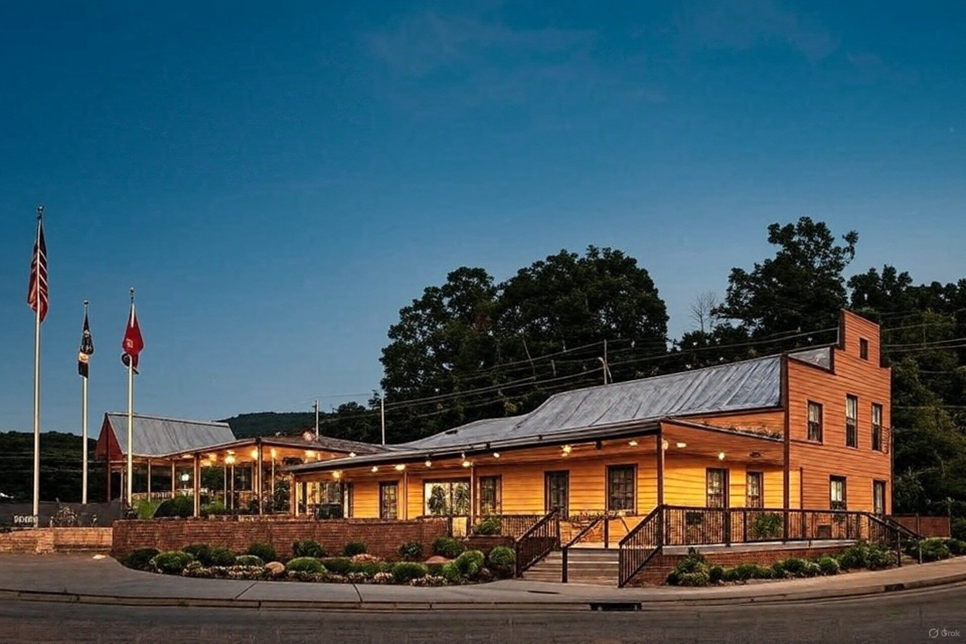 Exterior view of the Bush’s Visitor Center and museum at twilight in Chestnut Hill, Tennessee, with warm lighting and Smoky Mountain backdrop – featured image for top things to do in East Tennessee