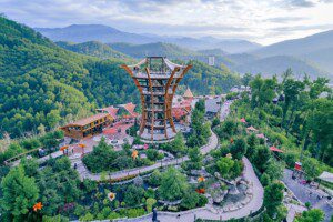 Aerial view of Anakeesta’s AnaVista Tower and Firefly Village in Gatlinburg, Tennessee, with the Great Smoky Mountains in the background – featured image for top things to do in Gatlinburg TN