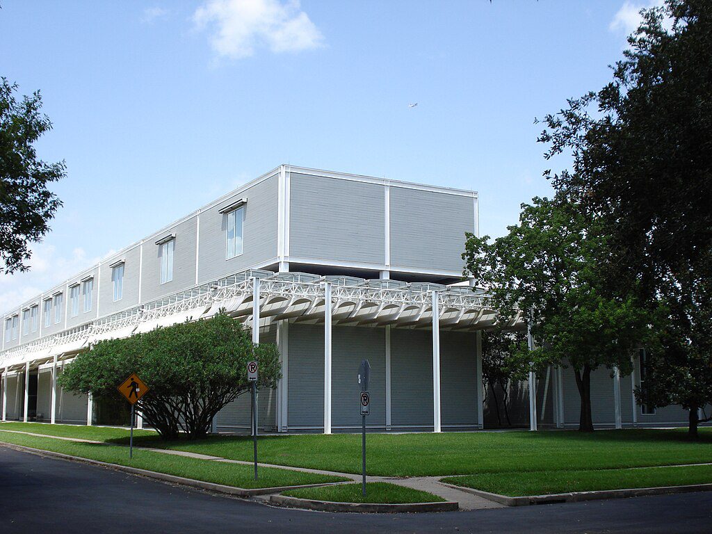 The Menil Collection main building exterior in Houston Texas with distinctive Renzo Piano architecture and iconic roof structure