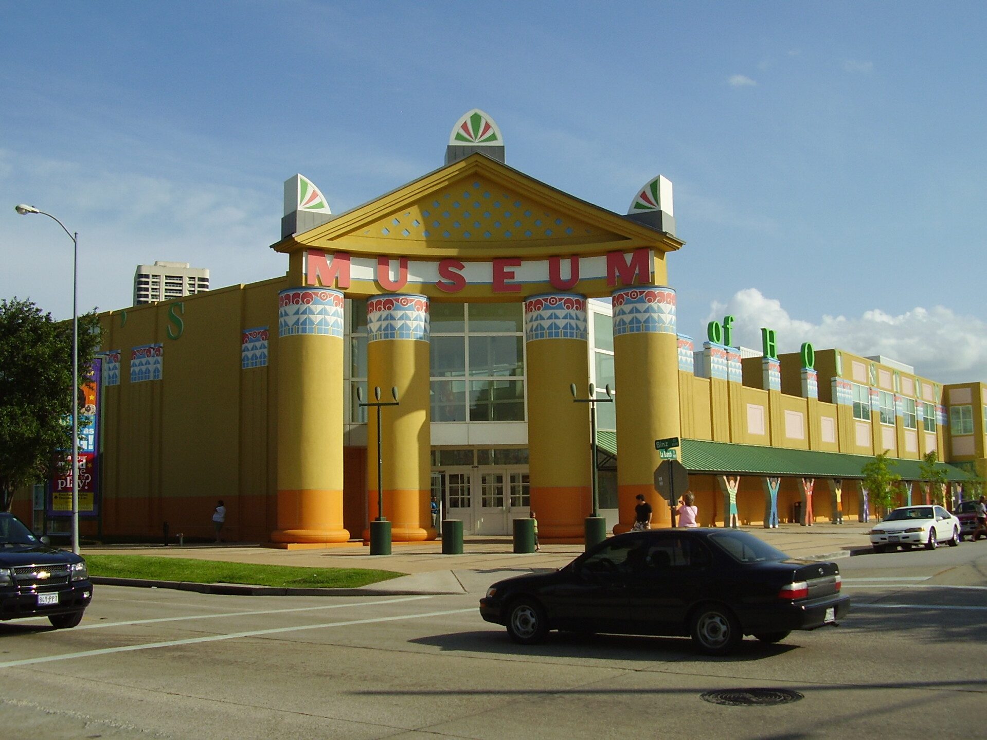 Children's Museum Houston colorful exterior showing whimsical architecture with yellow columns and Museum signage