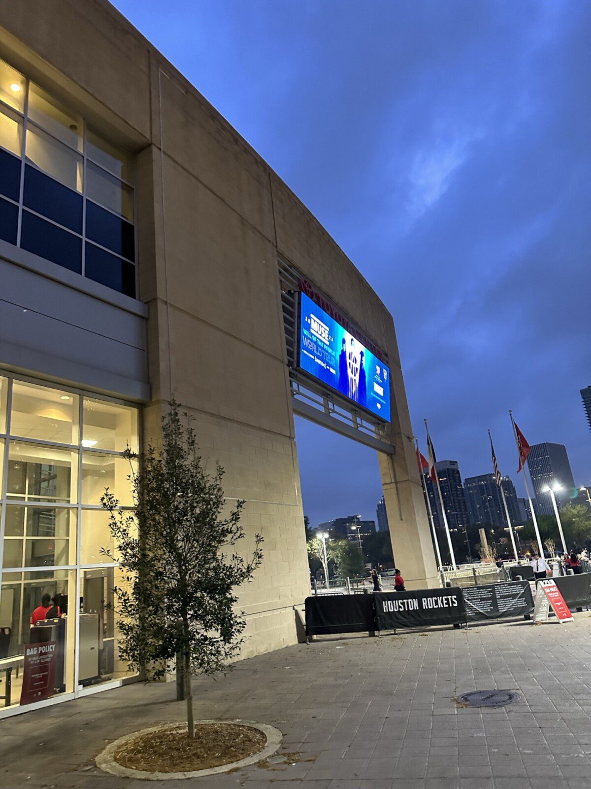 Toyota Center arena exterior at dusk in downtown Houston during Muse concert