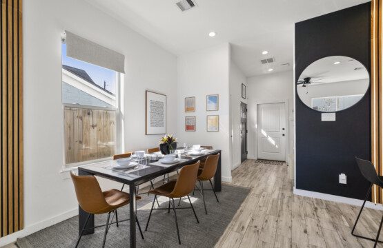 Open concept dining area at The Landing Pad Houston vacation rental with dining table for six near NRG Stadium