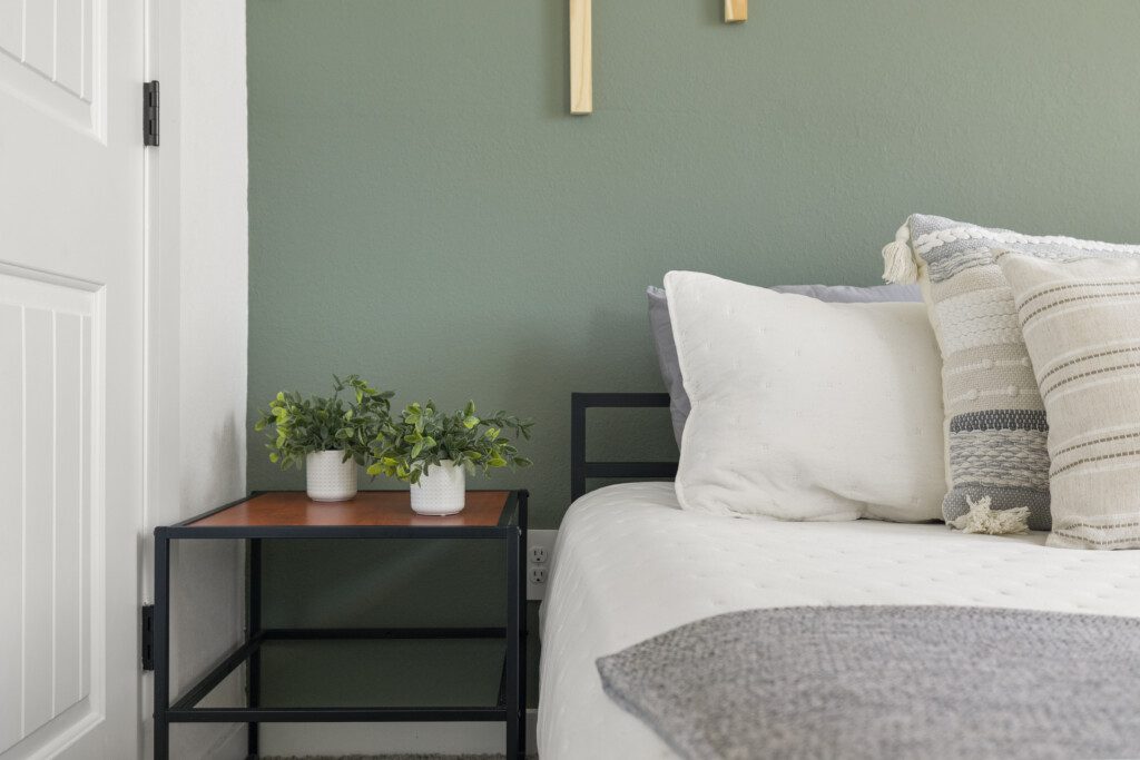 Guest bedroom detail with two beds at The Landing Pad Houston vacation rental near NRG Stadium